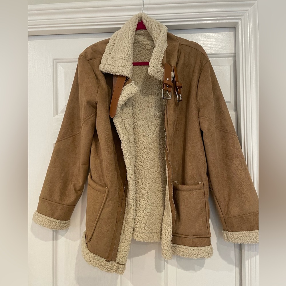Women’s faux shearling very soft jacket with buckles. Brand new. Size XL.